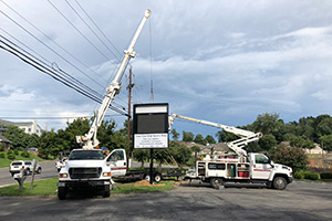 Installation of Signs, Scoreboards, and EMCs