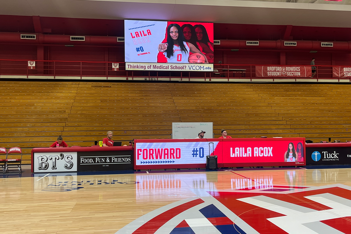 Radford Project Installation by Time Technologies Showing High Definition Video Board and LED Scorer's Table During a Game