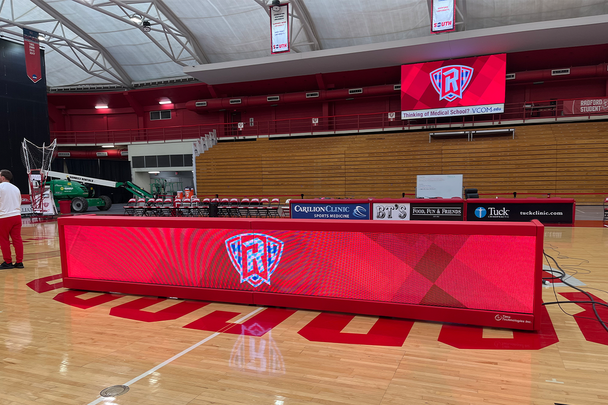 Radford Project Installation by Time Technologies Showing High Definition Video Board and LED Scorer's Table During a Game