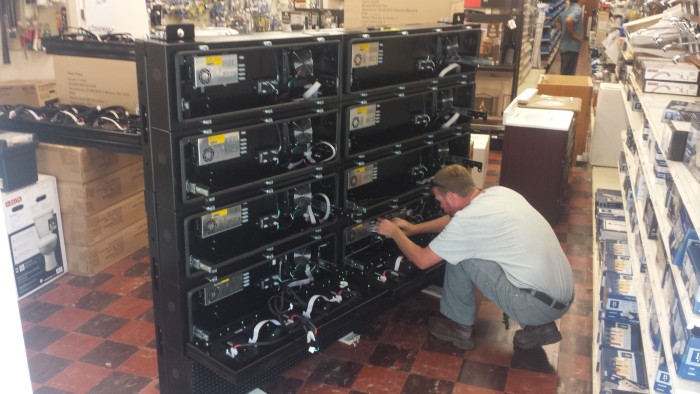 Trained service techician ready to install a new LED Sign at Northwest Hardware
